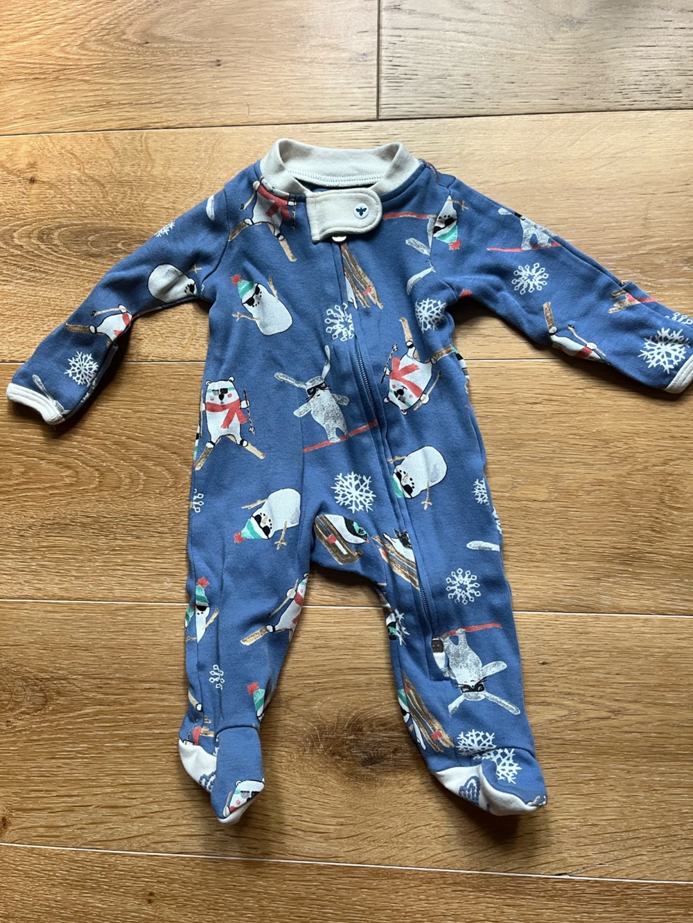 The cutest! Skiing Burt’s Bees Blue Snowman Ski Print Footed One-Piece for Babie